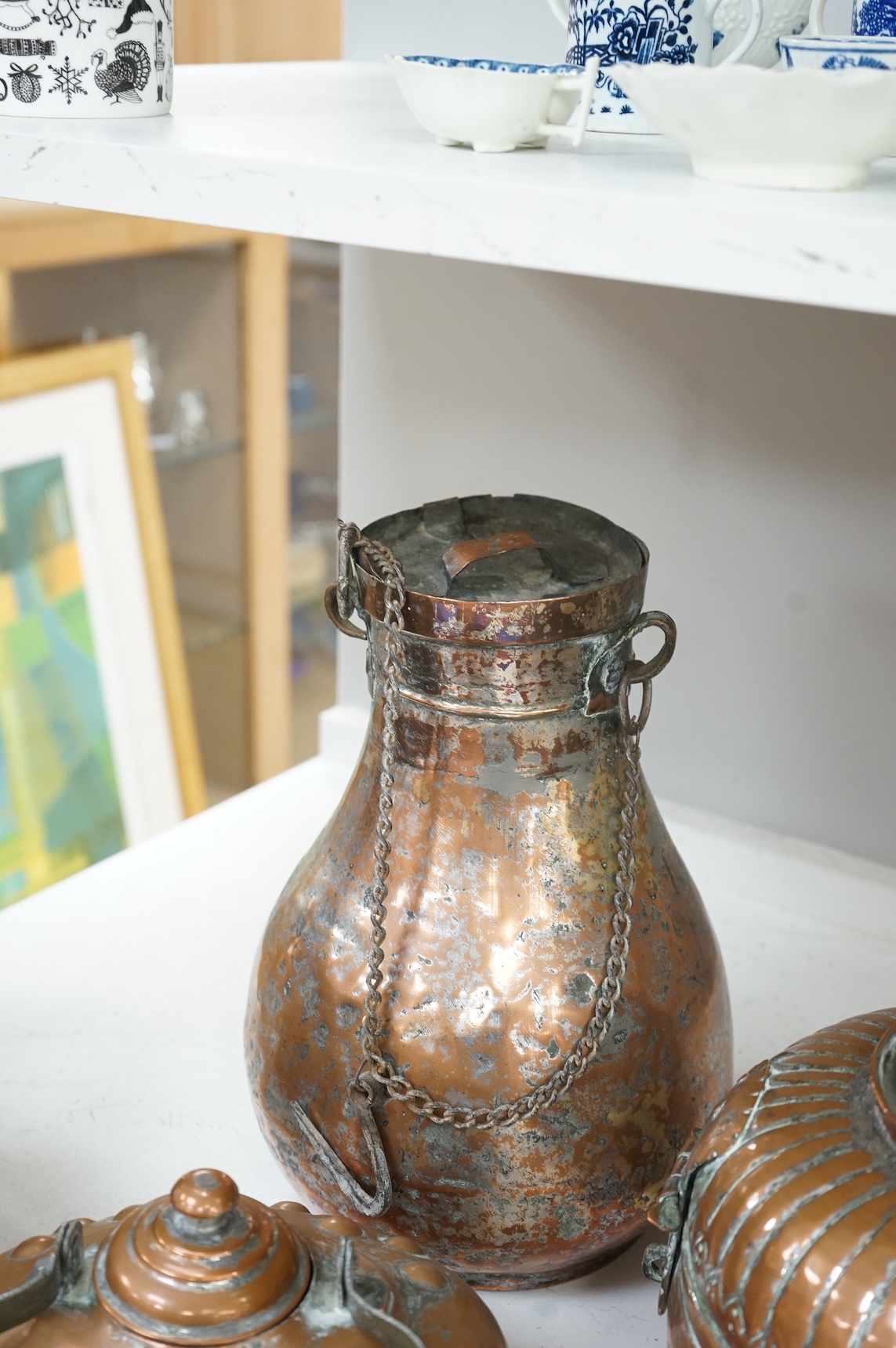 A collection of six various Arab copper vessels to include coffee pots, tallest 37cm